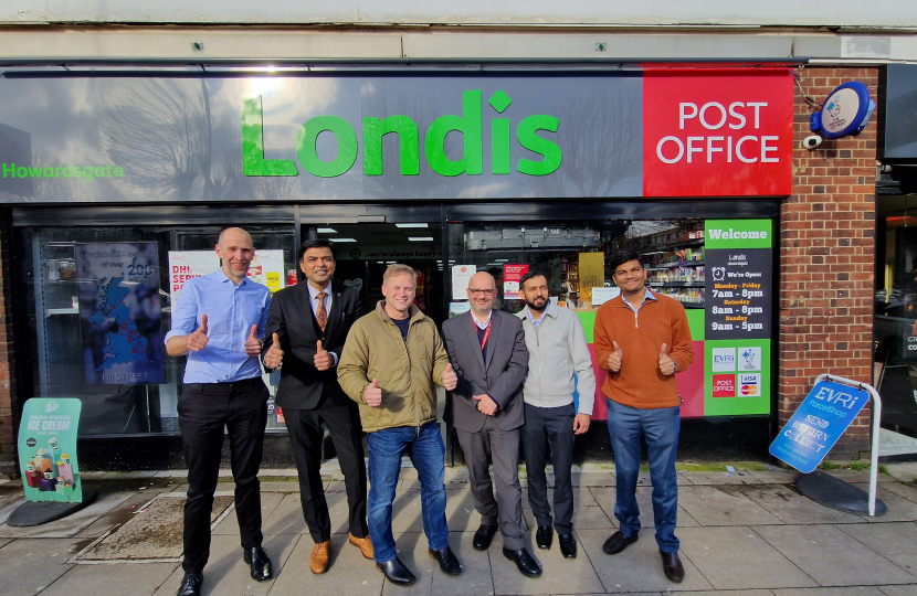 Grant outside the Welwyn Garden City Post Office with members of the Welwyn Garden Post Office Team and Regional Post Office Team