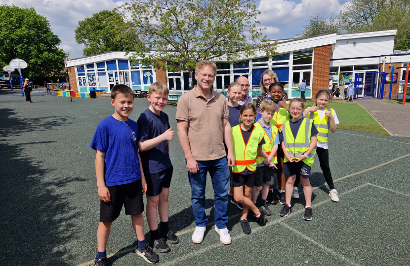 Grant, Jan, Tony and ambassadors outside the school