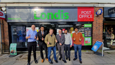 Grant outside the Welwyn Garden City Post Office with members of the Welwyn Garden Post Office Team and Regional Post Office Team