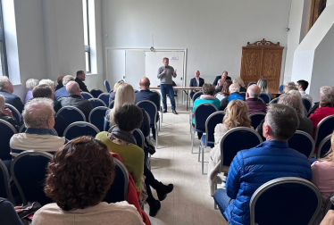 Grant speaking to the Brookmans Park community at the Twelve Apostles Church